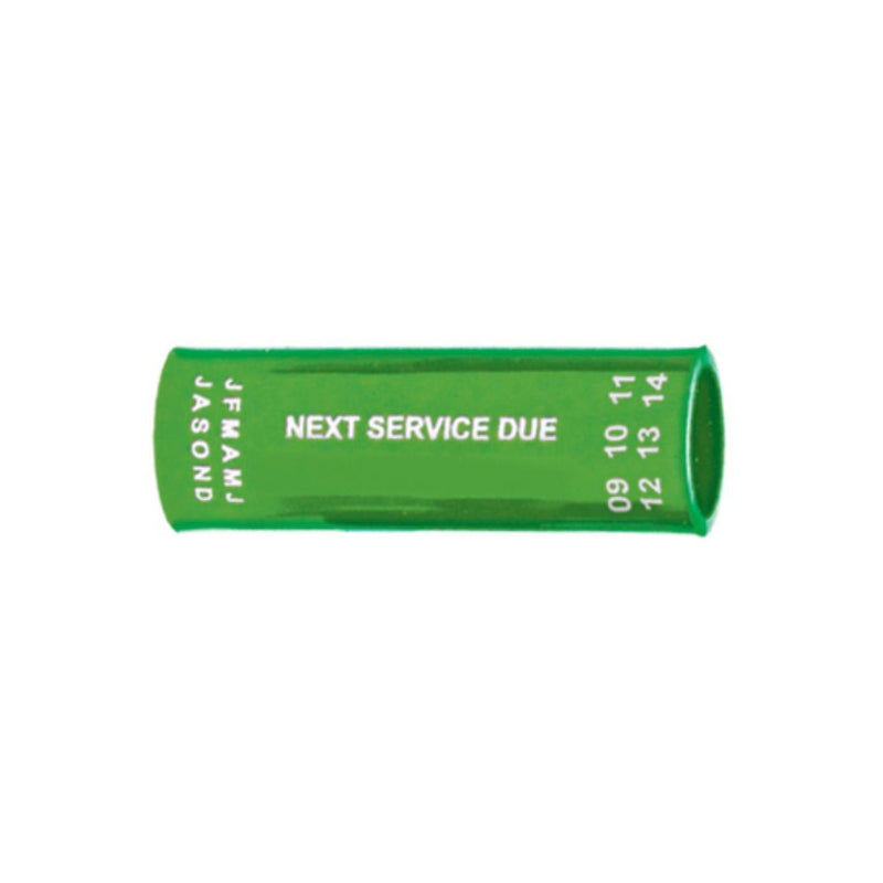 Green regulator hose tag with "NEXT SERVICE DUE" text and month/year markings – Innovative Scuba Concepts.