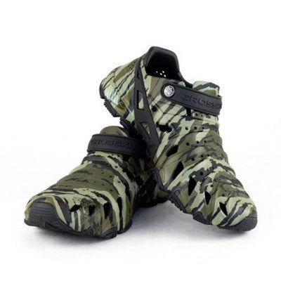 Pair of Crosskix 2.0 Bottomlands shoes positioned at an angle showing the textured camouflage pattern and black rubber outsoles