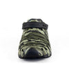 Single Crosskix 2.0 Bottomlands shoe front-facing view showing the camouflage upper, black velcro strap, and flexible construction