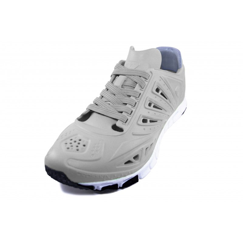 Crosskix APX Greystone athletic shoe three-quarter front view displaying the lace-up closure system, ventilated upper construction, and white midsole with dark outsole elements