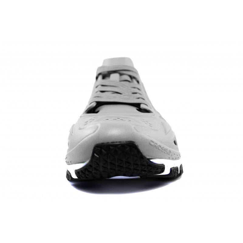 Crosskix APX Greystone athletic shoe front toe view showing the rounded toe box construction, lacing system, and black tread pattern on the white outsole