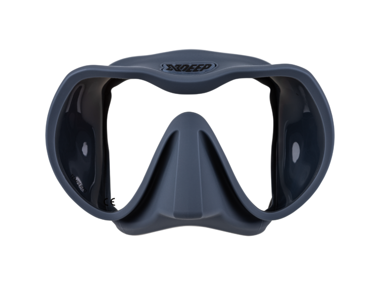 XDEEP gray silicone low-profile dive mask with clear frame and desert sand skirt, front view.