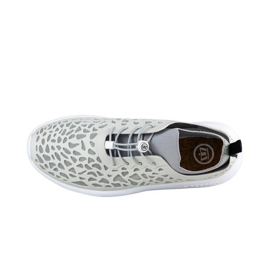 Top view of white Crosskix Tetra Stone water shoe featuring a perforated upper with geometric cutout pattern, gray interior lining, and white sole