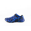 Side profile view of single Crosskix 2.0 Agua Marlin shoe displaying blue camouflage pattern and black sole with drainage holes