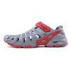 Crosskix 2.0 Red Dawn water shoe in gray and red colorway, side profile view showing ventilation holes and athletic design