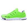Crosskix APX Greenline bright green athletic shoe with white sole, side view showing ventilation holes and lace-up design