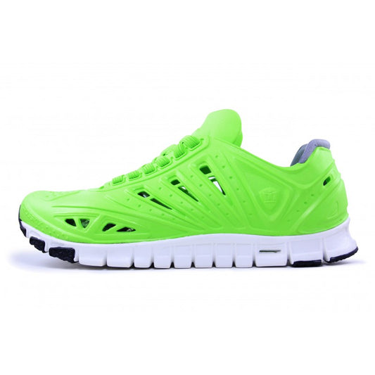 Crosskix APX Greenline bright green athletic shoe with white sole, side view showing ventilation holes and lace-up design
