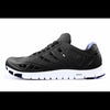 Crosskix APX Midnite athletic shoe side profile view showing black upper with perforated design details and white sole with purple accents