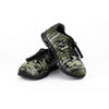 Crosskix APX Bottomlands by Mossy Oak camouflage sneakers pair viewed at an angle showing the textured camo pattern in green and brown tones with black accents