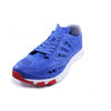 Crosskix APX Patriot blue sport shoe with mesh ventilation panels and red outsole details, three-quarter view