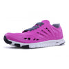Crosskix APX Rose Azure athletic shoe photographed from a three-quarter angle, highlighting the pink synthetic upper with strategic ventilation holes, gray lacing system, and distinctive white flexible sole with black grip zones