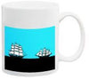 White ceramic mug with light blue background featuring black sailing ship silhouettes design