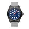 Hawaiian Lifeguard Association dive watch with black case, blue dial, luminous markers, red arrow minute hand, and white rubber strap