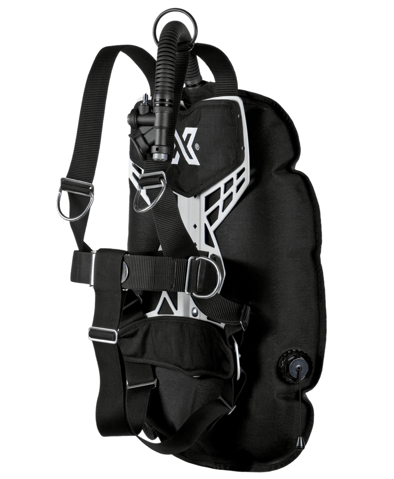 XDEEP GHOST BC – front view showing compact wing profile, minimalist harness, and inflator hose
