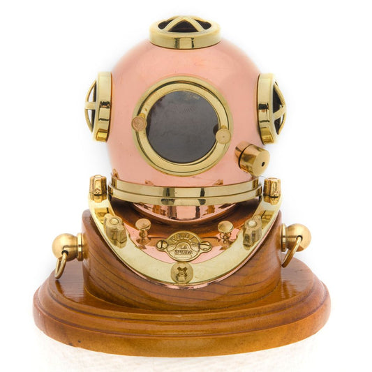 Decorative brass and copper deep-sea diving helmet on polished wooden base, detailed nautical collectible by Innovative Scuba Concepts.