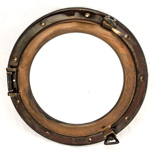 A round, vintage-style brass porthole frame with latch closures, ideal for nautical décor or clock insert replacements.