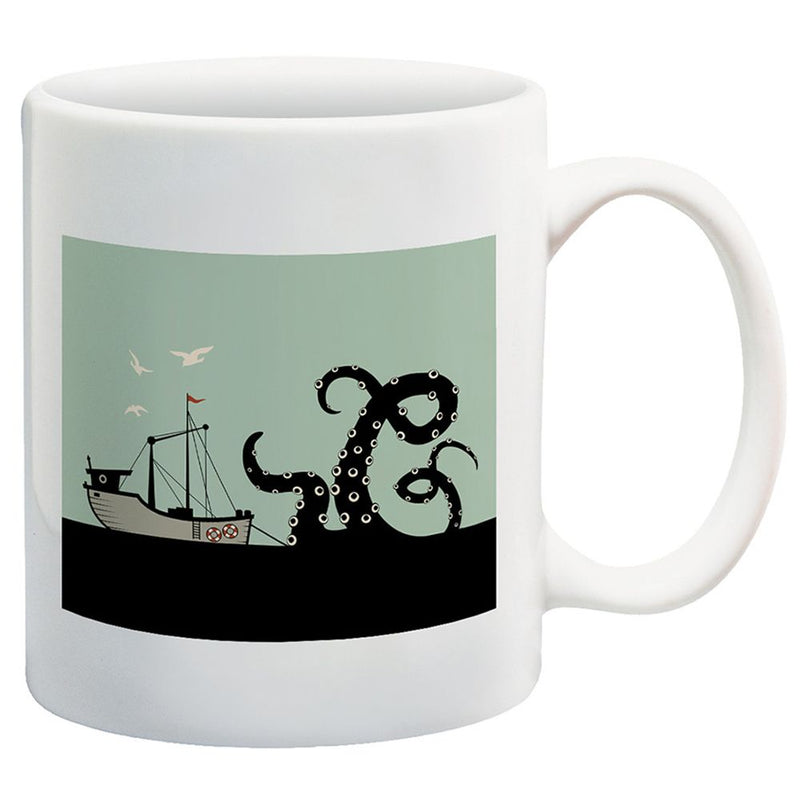 Giant octopus attacking sailing ship with seagulls flying overhead on mint green and black background printed on white ceramic coffee mug