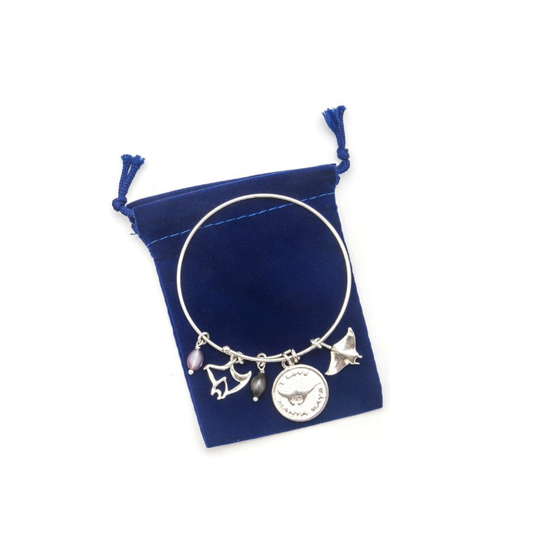 Innovate Scuba Concepts silver charm bracelet with marine-themed charms in blue velvet pouch