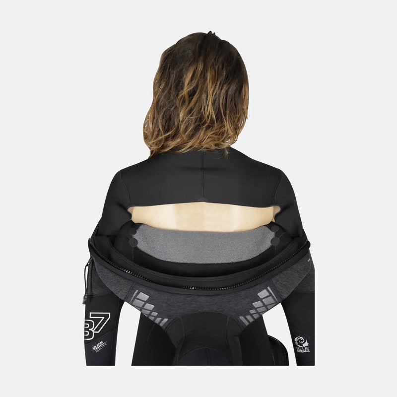 Person wearing a black back brace on a white background