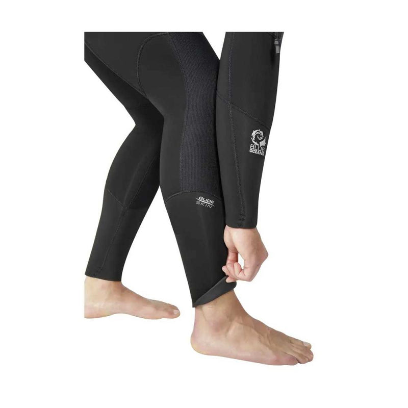 Black wetsuit pants with a brand logo on a white background