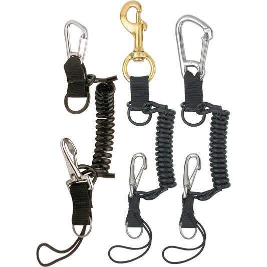 Black Snappy Coil Pro lanyards by Innovative Scuba Concepts, featuring heavy-duty coiled cords with a variety of clip styles including stainless steel, brass, and carabiner clips – displayed on a white background.