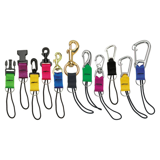 Assorted scuba gear connectors with various clips, carabiners, and colorful nylon straps by Innovate Scuba Concepts.