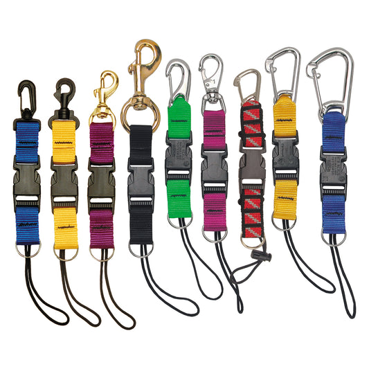 Variety of multi-color lanyards with different clip types including split rings, carabiners, and snap hooks for flexible scuba gear management.