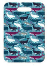 Innovate Scuba Concepts luggage tag with a repeating pattern of colorful whales swimming across a teal-blue ocean background.